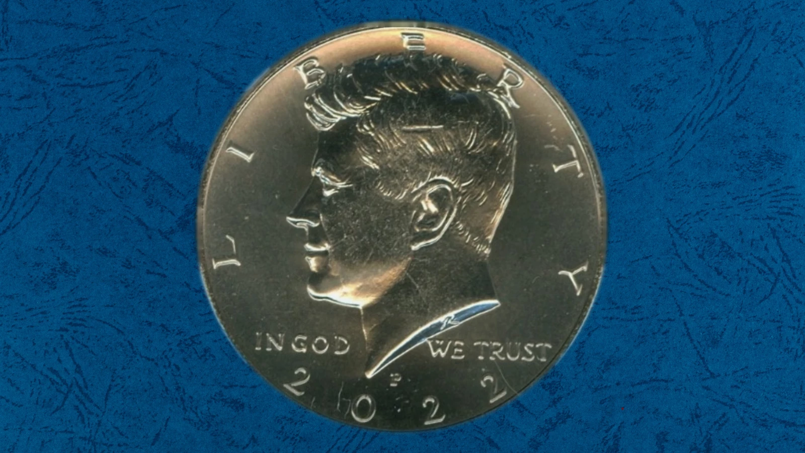 2022-P Kennedy half dollar strike-through error showing weakness in portrait detail from foreign material